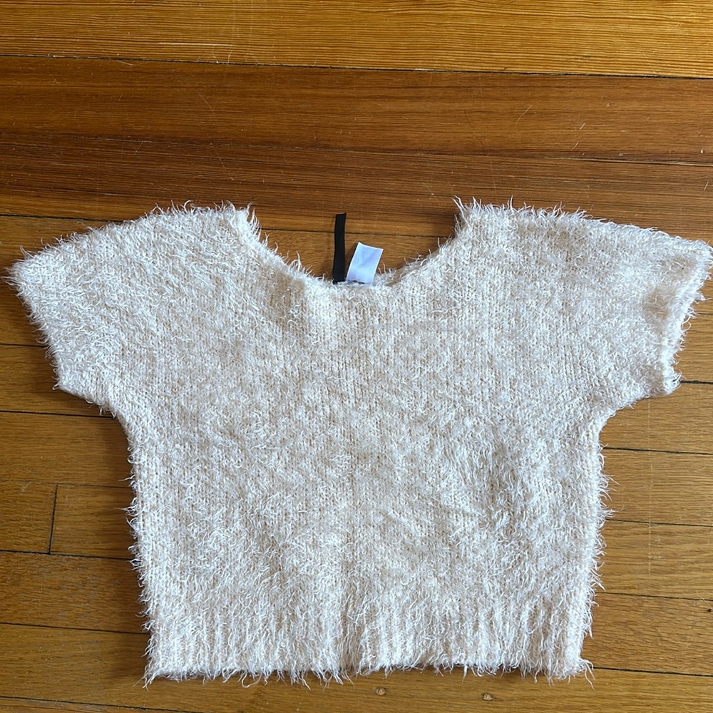 Peach colored fuzzy sweater